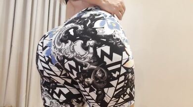 twerking in gym shorts and bouncing his butt on the chair