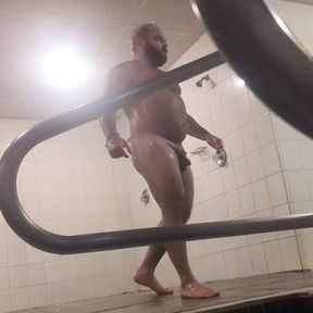 Sexy bear in the public gym showers