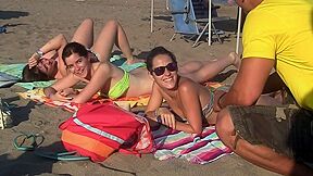 Spanish chicks seduced on a beach