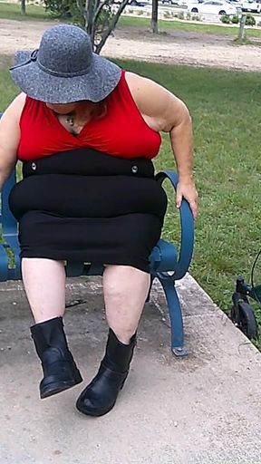 Nurse Vicki Smoking in the Park on a Bench All Dressed up