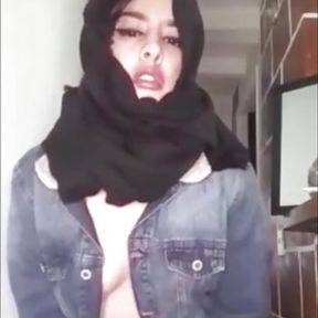 Arab wearing burqa and kneeling for her master