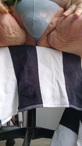 Early morning porch thong.  Fat guy slaps his nuts n shows ass