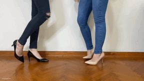 TWO GIRLS WEARING HEELS STEPPING ON EACH OTHER’S FEET - MOV Mobile Version
