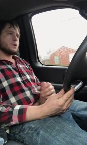 Stroking my big cock while driving