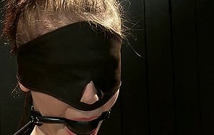 Suspended upside down slave gets toyed