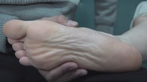 We get a close up view of Mei Mei's delicate soles