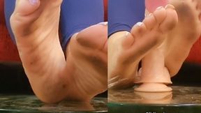 Using my dirty feet to play with my toy