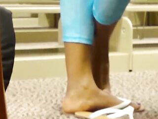 Black teen feet in library