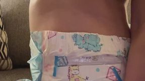 Ansley Mae wears a diaper on vacation