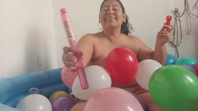 Naked Bubble Blowing in a Pool Full of Balloons