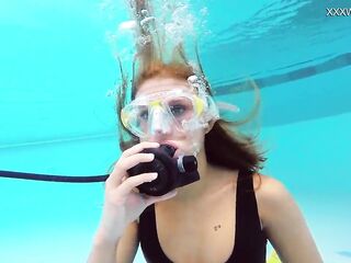 Katya Nakolkina with some other angel in the pool