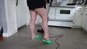 Muscular Calves while Vacuuming in Green Slides MP4 480