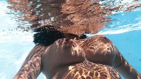 Latina Yorgelis shows off big ass and boobs by the pool