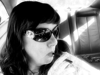 MRS. ROMAN HOLDER SMOKIN' VS120s WITH WHITE LACE GLOVES AND SUNGLASSES