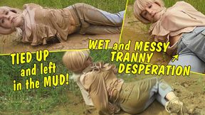 Tied up and left in the mud! Wet and messy tranny girl pees in her pants!