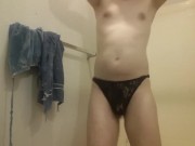 smooth twink-like bisexual gay man dances shakes hips in lace panties