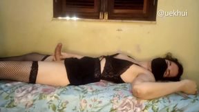 SISSY WEARING A BLACK DRESS AND PANTYHOSE LYING DOWN MASTURBATING HIS DICK - UEKHUI