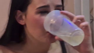 Teen drinking her own piss