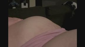 Lying Down and Rubbing My Swelling Belly