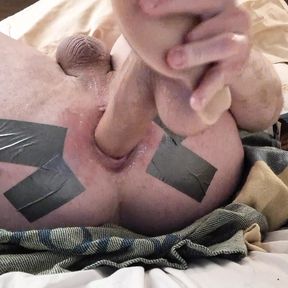 Slut gapes with anal dildo