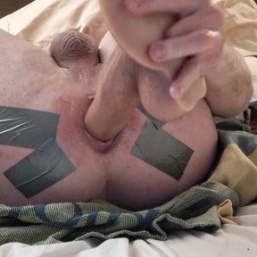 Slut gapes with anal dildo