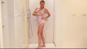 A Mature and Sexy Woman Masturbates Her Vagina in the Shower