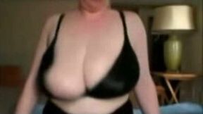My big tittied MILF wife bounces her right boob from side to side