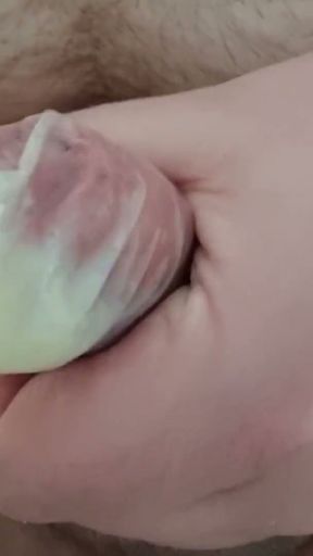 First cumshot after one week - fill the condom   Clip 1