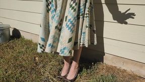 Fifi peeing down her legs into her brown high heels until they fill up with pee