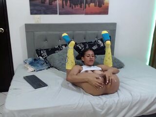 Lascivious beauty masturbates and shows her butt