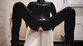 Latex bodysuit solo with fucking machine and cumming