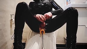 Latex bodysuit solo with fucking machine and cumming