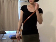 crossdresser wearing a mini skirt