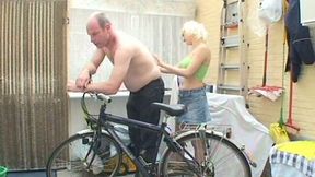Cuddly blond hussy gives a cock massage to aroused daddy