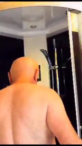 Key moment from "COMPLETE 4K MOVIE SHOWER IN A EUROPEAN LOG CABIN WITH ADAMANDEVE AND LUPO"