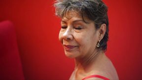 Mature temptation dressed in red