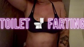Gassy MILF farting on the wc