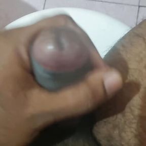 Indian black guy musterbation in toilet