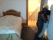 masked man in orca wetsuit has fun with jeans wearing sex doll