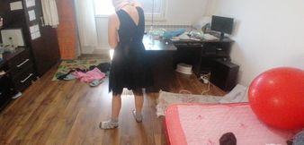 Amateur Woman Has Fun Trying on Clothes and Cutting Them