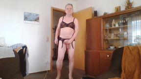 Andreas with suspender belt and bra jerking off