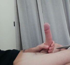 Hot guy whacks off watching gay porn until cum blasts everywhere