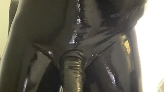 Latex-clad masturbation and cumshot