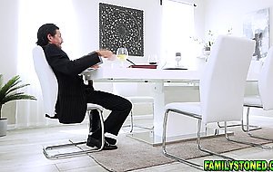 Teen while her mom is gone goes under table to suck cock