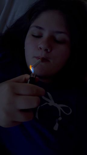 Young brunette teen smokes and shows off her pawg