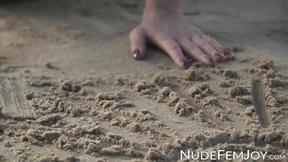 ”Perfect goddess like Natalie E having fun teasing herself in the white sand”