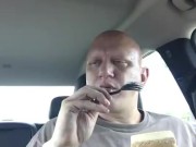 piggy eating cake in car