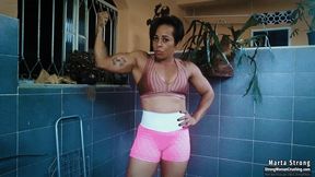 Marta Strong flexes in pink