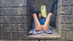 Naked in public place and pissing
