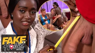 Horny ebony babe inspects two big hard cocks in a wild threesome